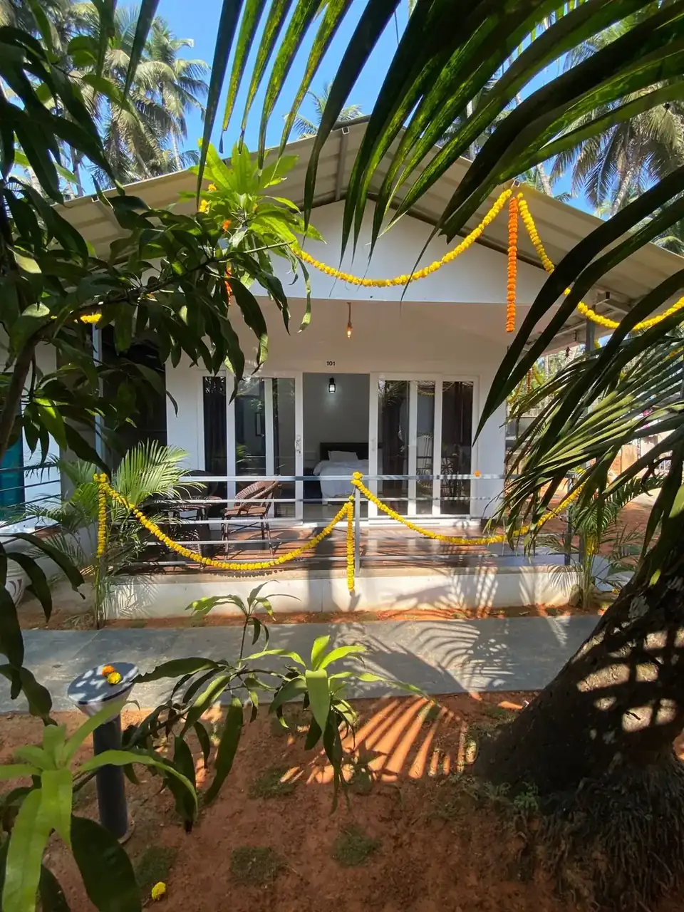 Saffron Sun Palolem property exterior surrounded by tropical greenery